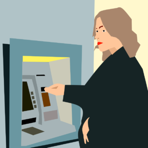 atmを利用する女性